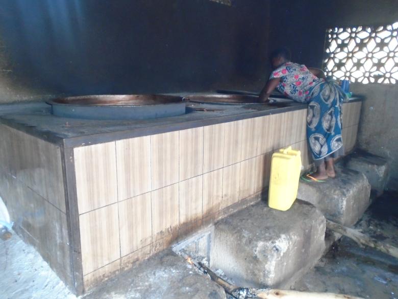 Working with business to install energy-saving stoves in schools